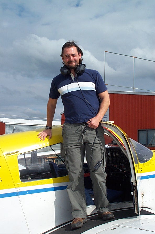 Josh Olson on the wing of Cherokee GODP after his First Solo Flight on April 9, 2009.  Langley Flying School.